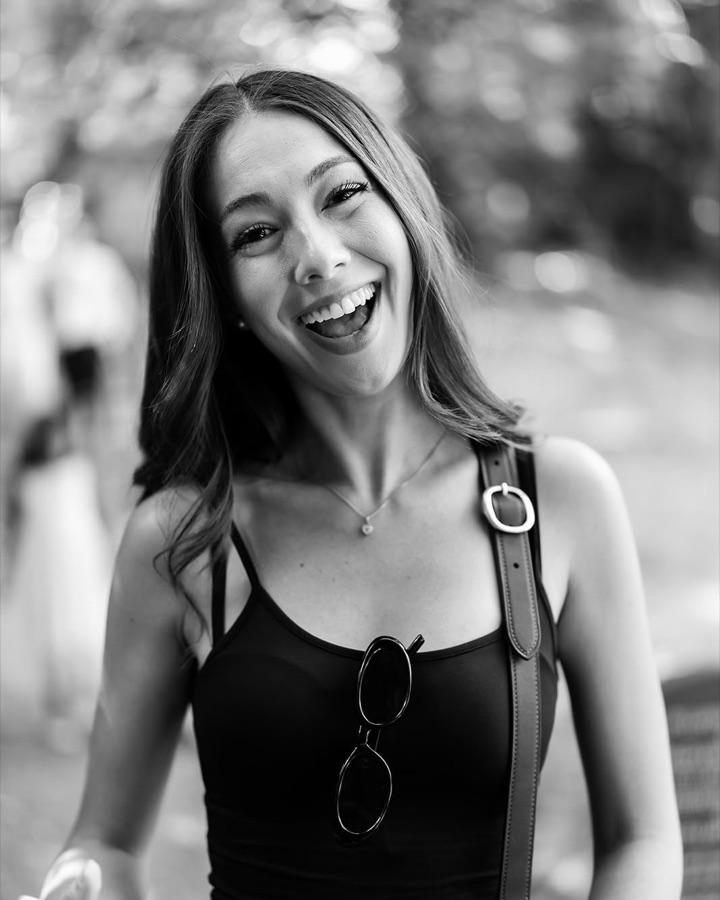 Alba laughing at a wedding in London