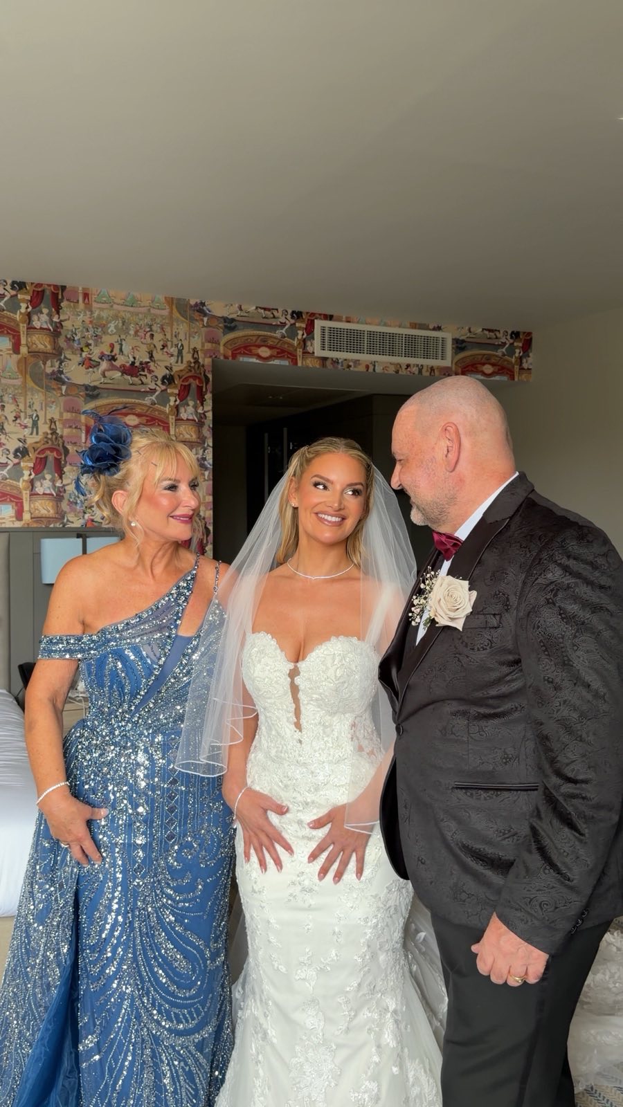 Bride with her mum and dad before the ceremony